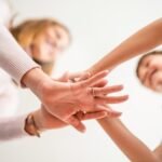 Hands of family together, unity, trust and peace concept